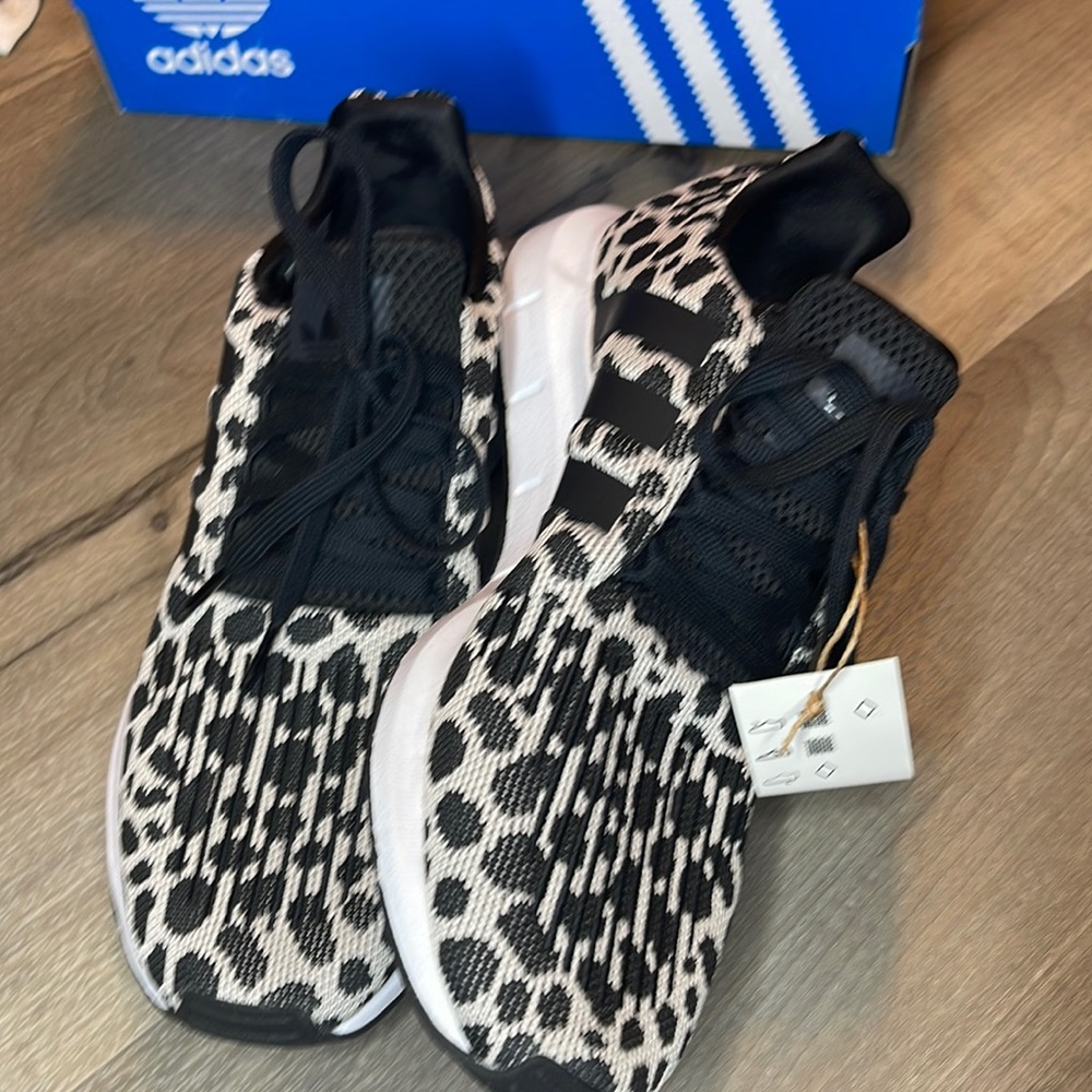 NWT. Adidas swift run. Size 9 W. Box is mangled up